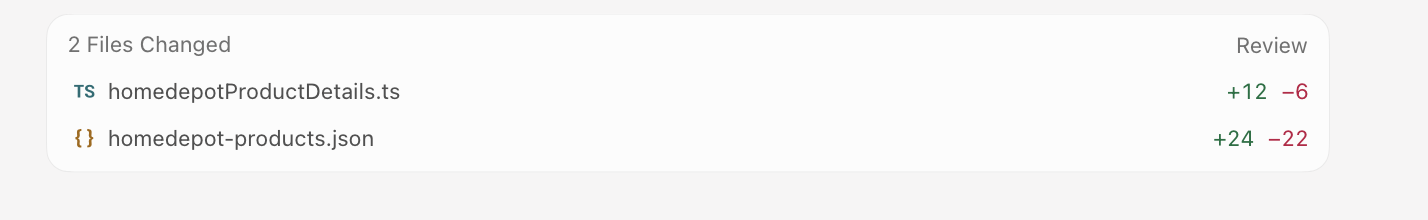 Cursor's file review panel showing two files changed, homedepotProductDetails.ts and homedepot-products.json, with their line counts